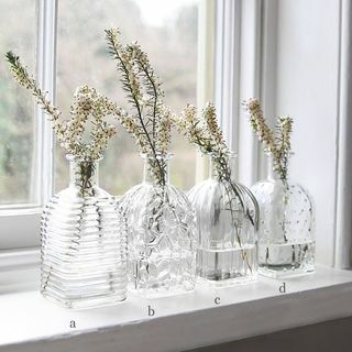 Vaso per bottiglie quadrato in vetro pressato