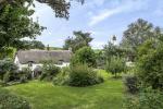 Uno dei più antichi cottage con il tetto di paglia nel West Somerset in vendita