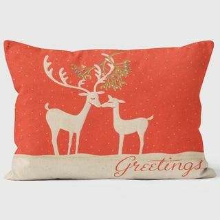 Cartolina di Natale con renne che si baciano sotto il cuscino di vischio