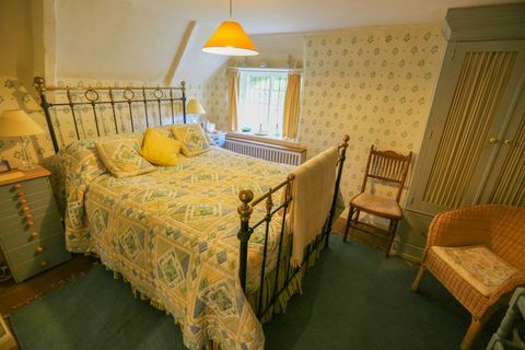 Parliament House cottage, camera da letto, agenti immobiliari Woods e banditori