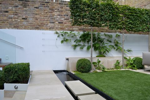 Design contemporaneo del giardino a Kensington - progettato da Kate Gould - costruito da The Garden Builders