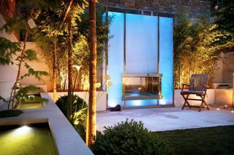 Design contemporaneo del giardino a Kensington - progettato da Kate Gould - costruito da The Garden Builders