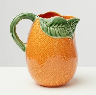 Brocca in ceramica arancione