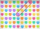 Queste tende a tema cuore di caramelle hanno la parola "amore" su di loro. Riesci a individuarlo?